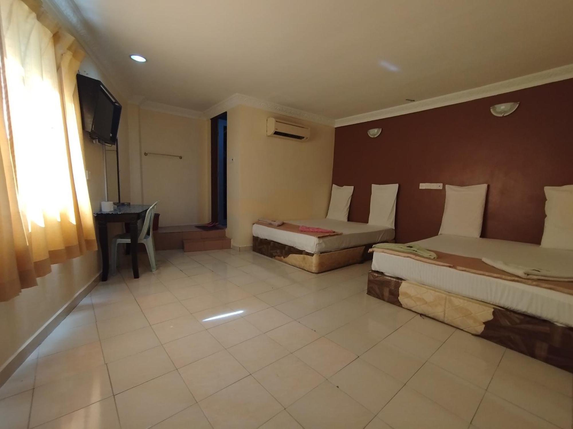 Sentosa Villa Hotel Кланг Экстерьер фото