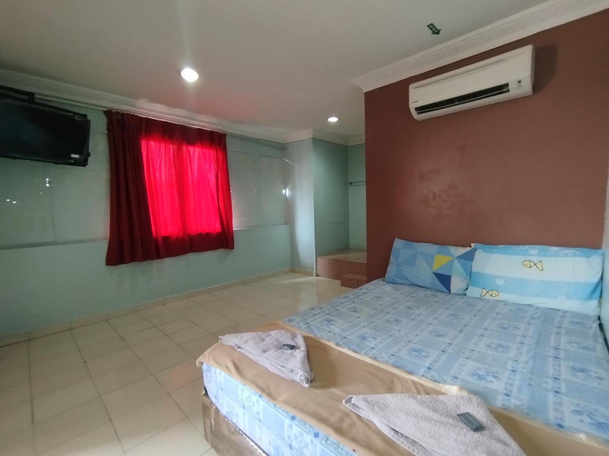 Sentosa Villa Hotel Кланг Экстерьер фото